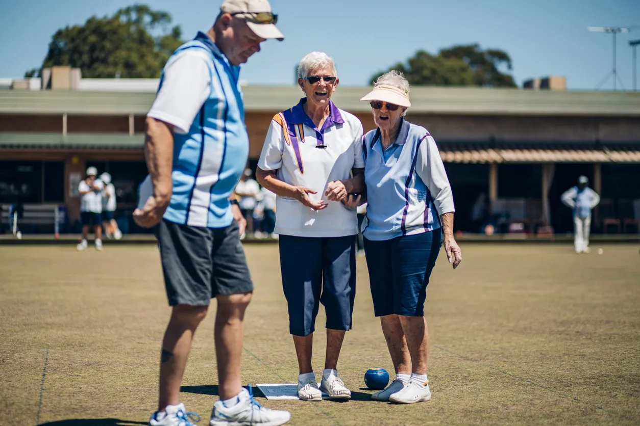 People enjoying lawn bowling